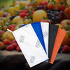 Tampon absorbant rouge pour barquettes de myrtilles et emballages de petits fruits
